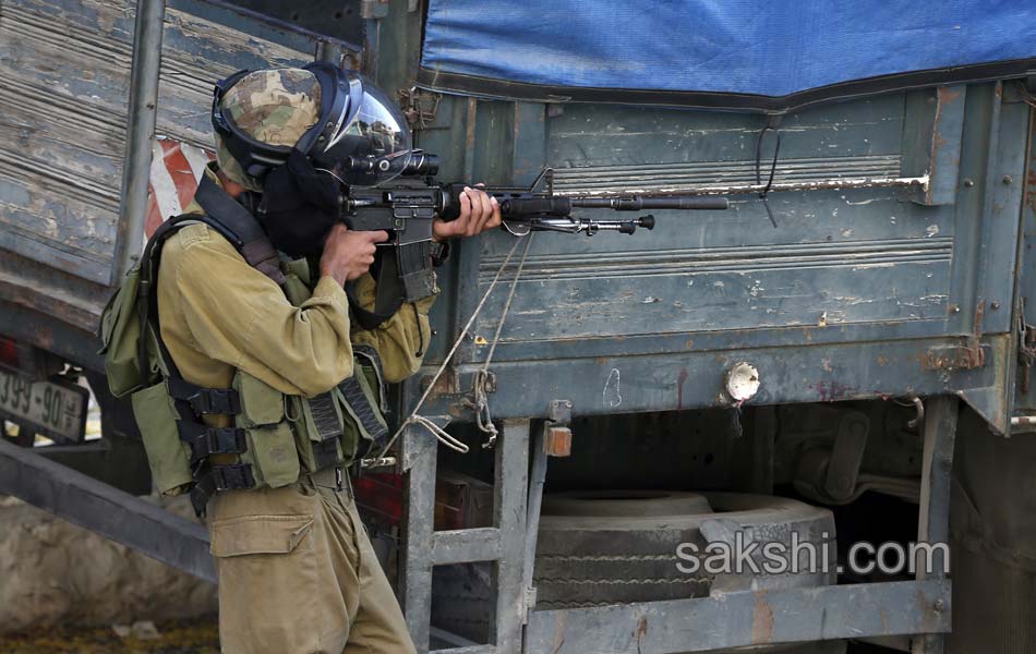 Palestinian demonstrators during clashes in the West Bank12