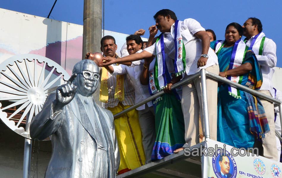 ys jagan mohan reddy performs milk bath to ambedkar statue - Sakshi2