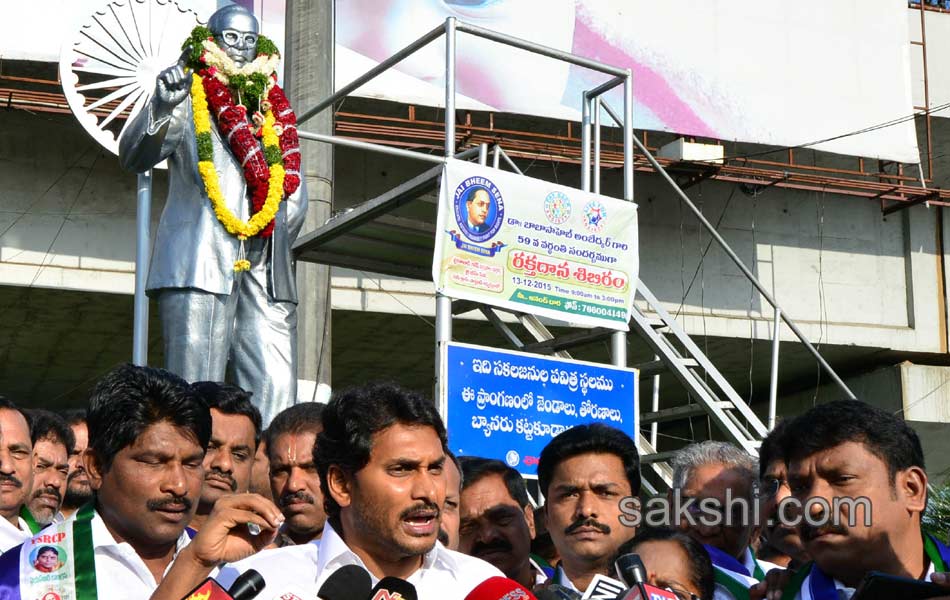 ys jagan mohan reddy performs milk bath to ambedkar statue - Sakshi5