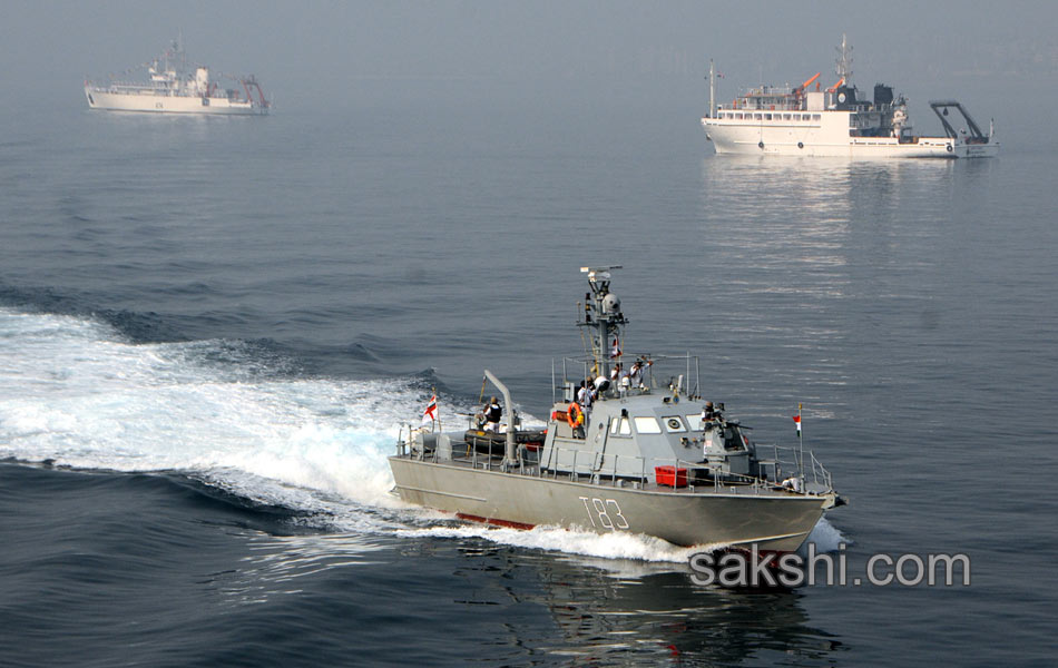 illuminated ships anchored off shore Vizag2