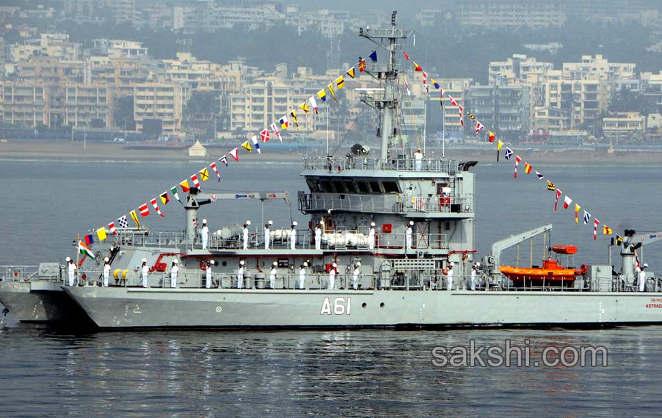 illuminated ships anchored off shore Vizag5