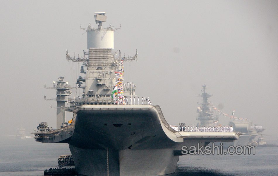 illuminated ships anchored off shore Vizag10