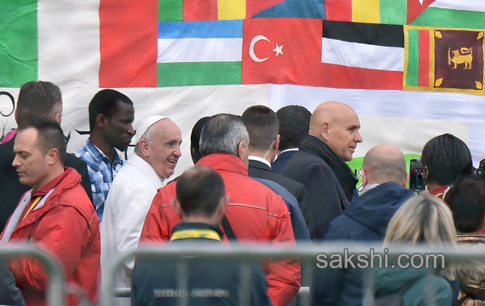 Pope Francis performs the foot washing11