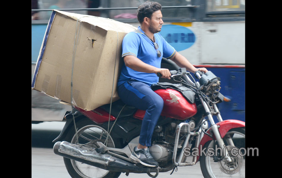 two wheelers with heavy luggage14