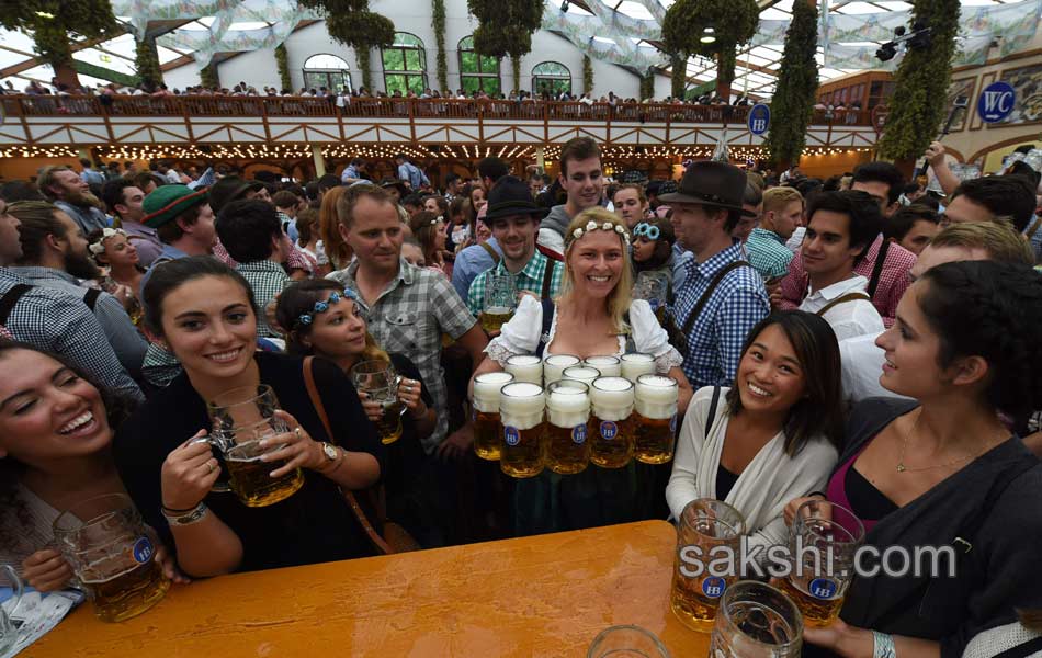 Visitors enjoys the Oktoberfest beer festival in Munich  Germany2