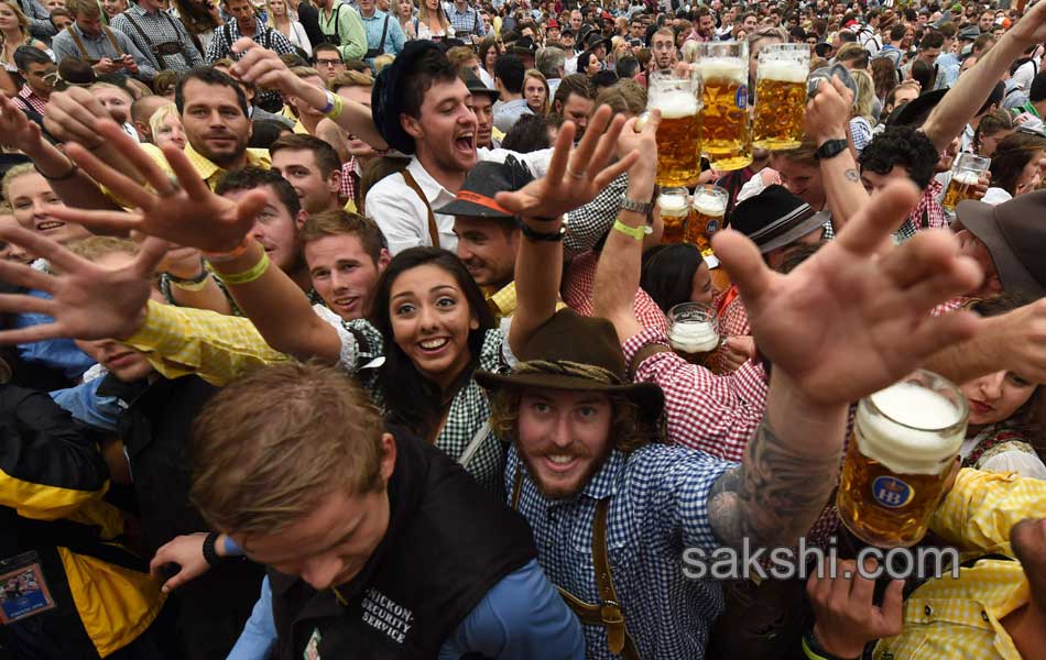 Visitors enjoys the Oktoberfest beer festival in Munich  Germany8