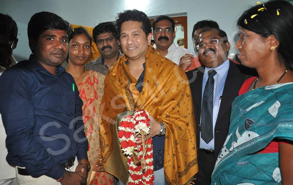 Sachin visits his adopted village Puttamraju Kandrika in AP12