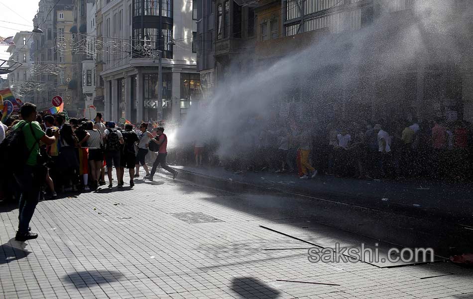 Police fire tear gas to break gay pride parade in Turkey - Sakshi9