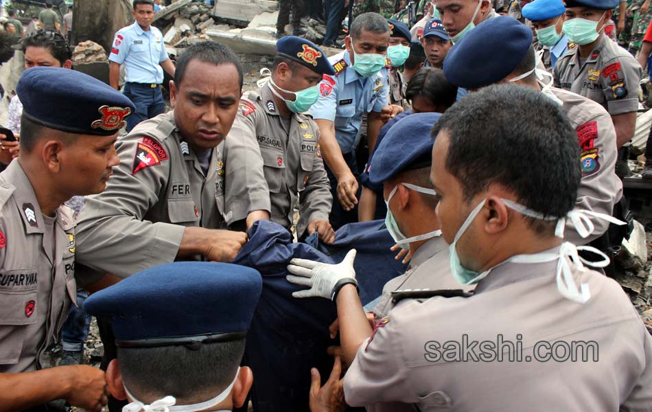 38 dead after Indonesian military plane crashes in flames19