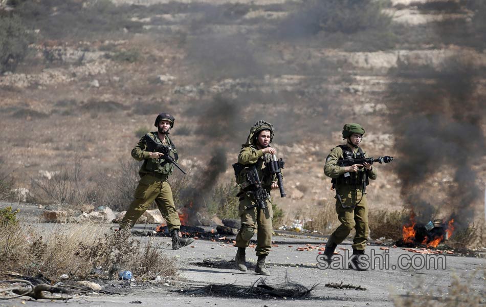 Palestinian demonstrators during clashes in the West Bank5