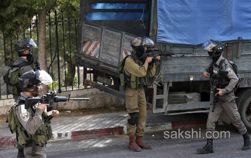 Palestinian demonstrators during clashes in the West Bank9