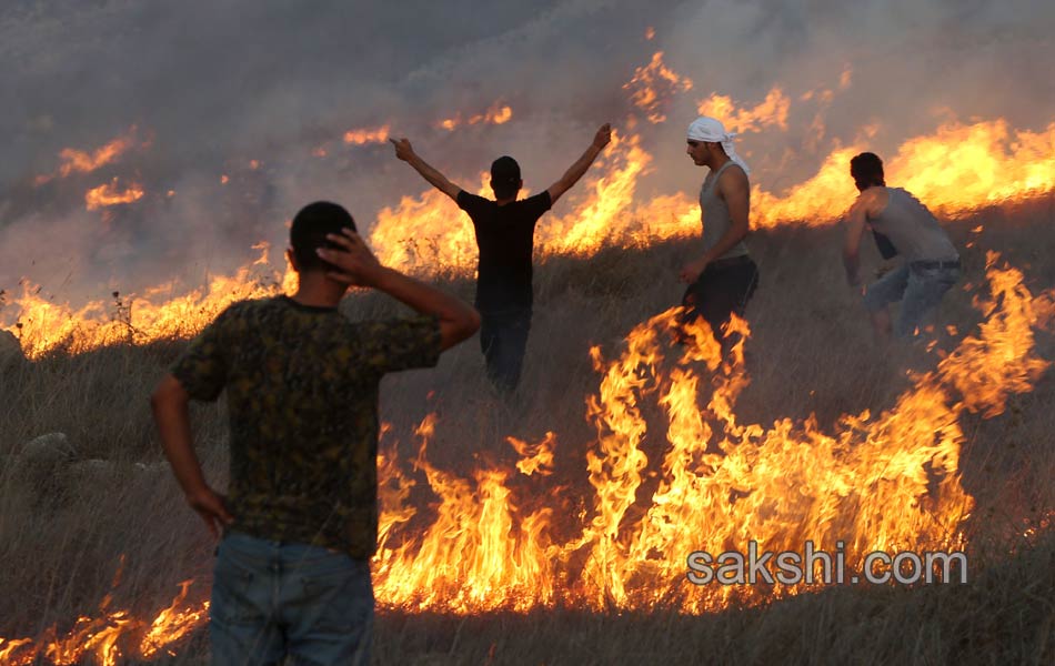 Palestinian demonstrators during clashes in the West Bank15