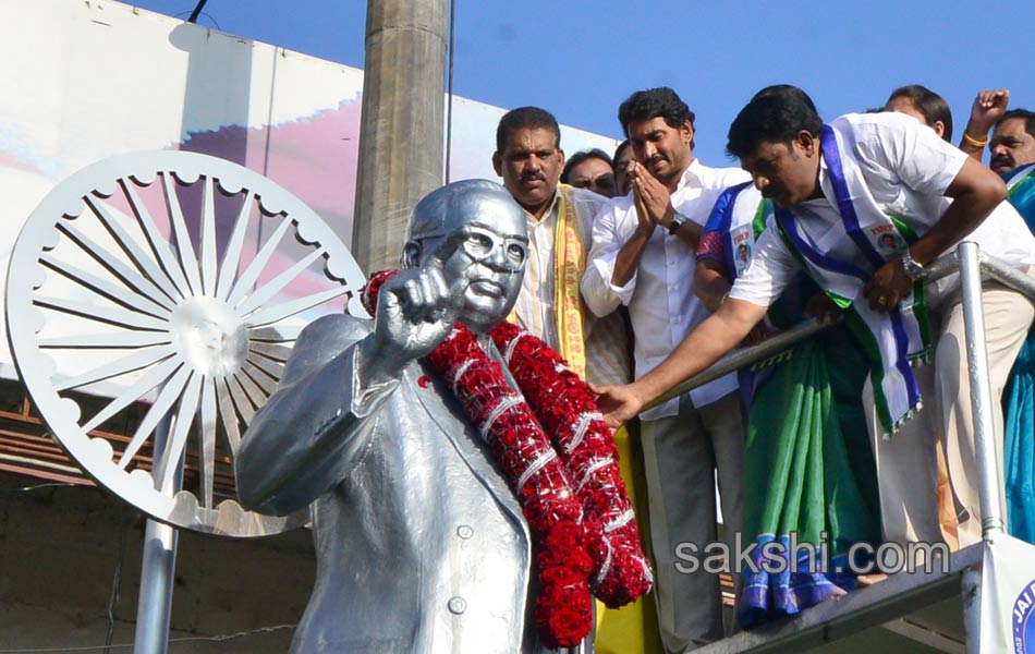 ys jagan mohan reddy performs milk bath to ambedkar statue - Sakshi3