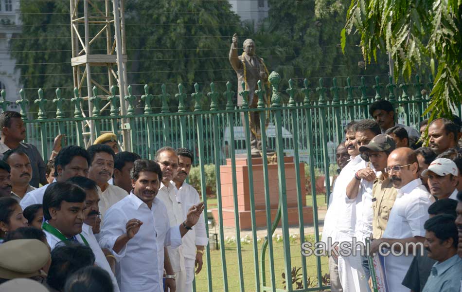 ys jagan mohan reddy performs milk bath to ambedkar statue - Sakshi12