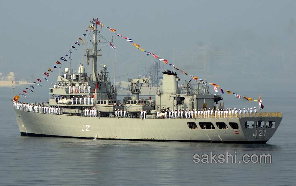 illuminated ships anchored off shore Vizag20