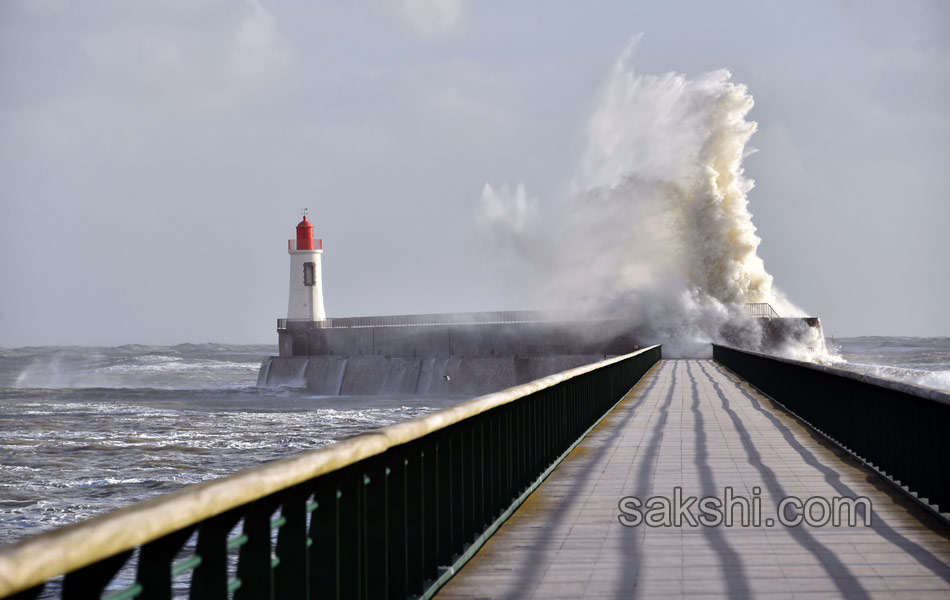 Waves crash near the Port19