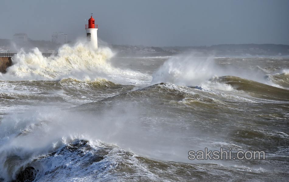 Waves crash near the Port24