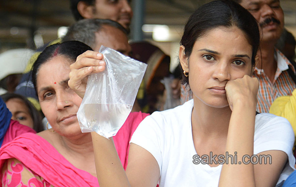 Thousands of asthma patients take fish prasadam in Hyderabad12