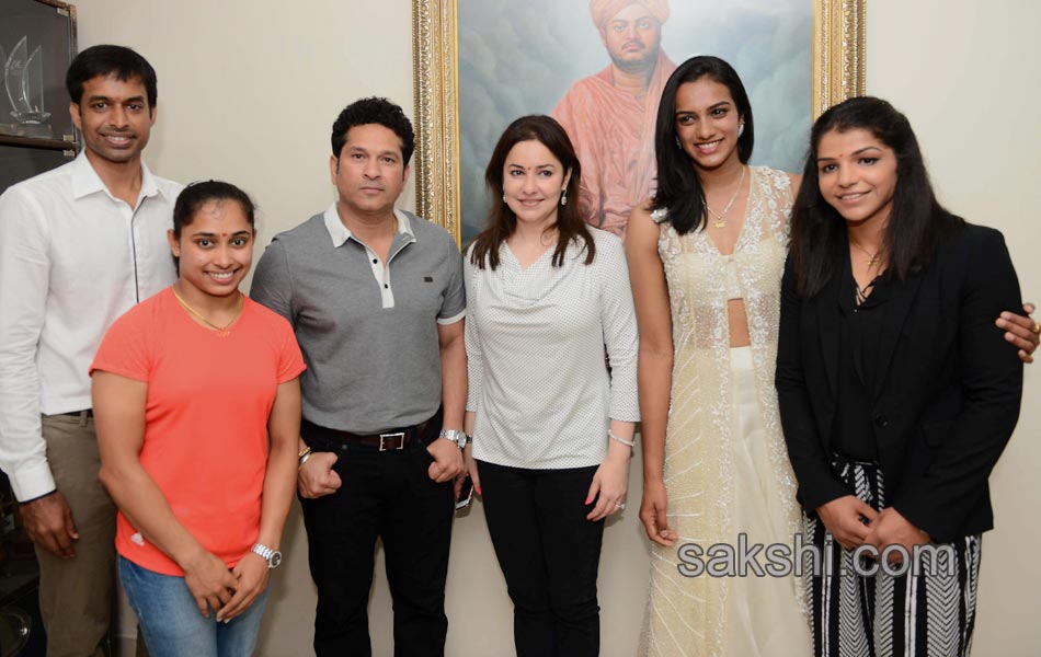 PV Sindhu Sakshi Malik  Dipa Karmakar receive BMW cars  Sachin Tendulkar lauds tr o11