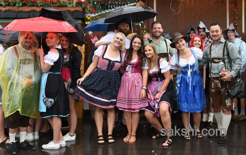 Visitors enjoys the Oktoberfest beer festival in Munich  Germany11