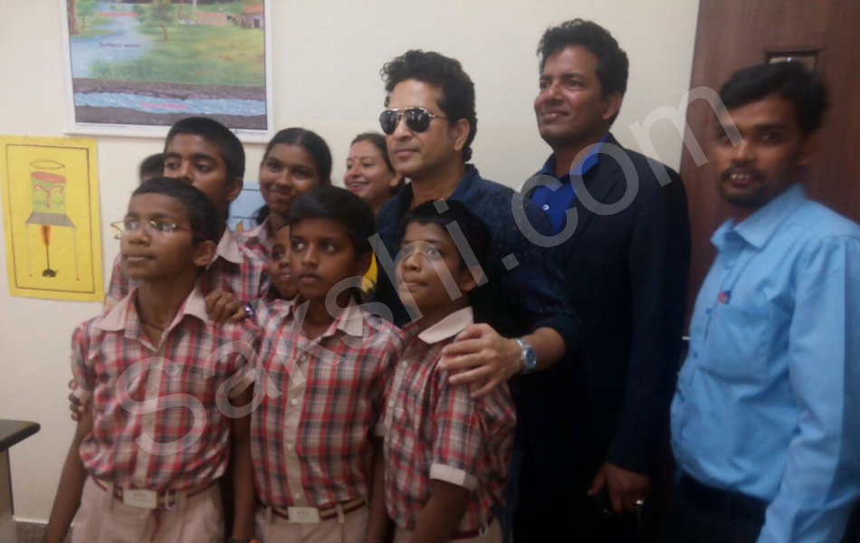 Sachin visits his adopted village Puttamraju Kandrika in AP16