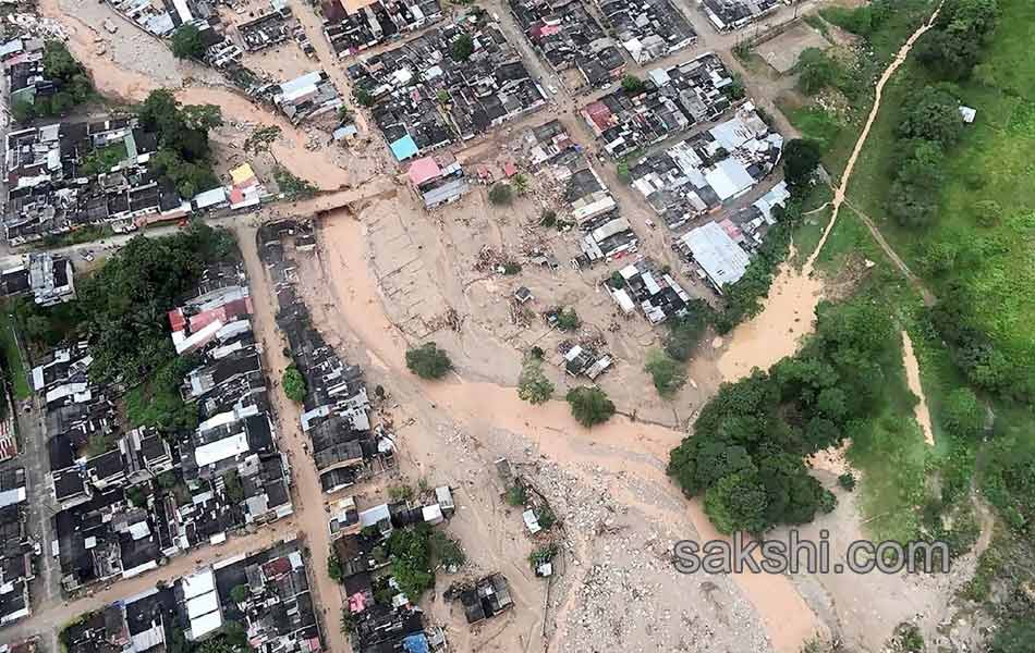 Colombia shaken after surging rivers avalanche leaves10