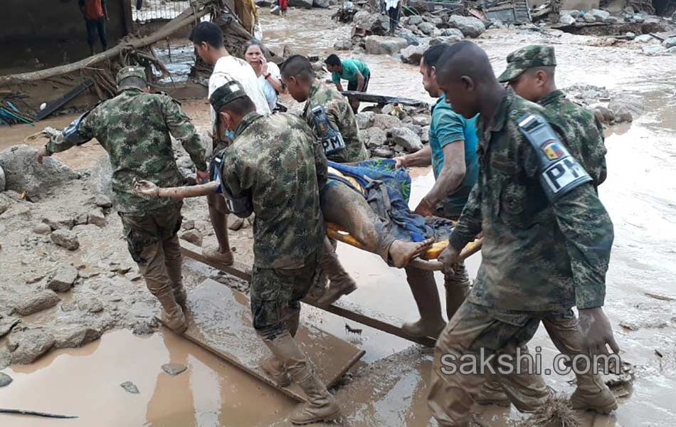 Colombia shaken after surging rivers avalanche leaves11