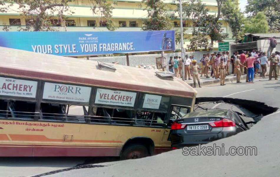 Huge cave in on popular Mount Road in Chennai swallows bus and car - Sakshi12