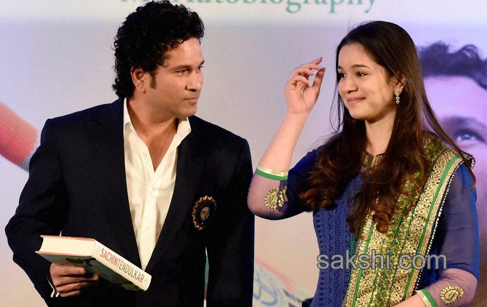 Sachin Tendulkar presents a copy of his autobiography2