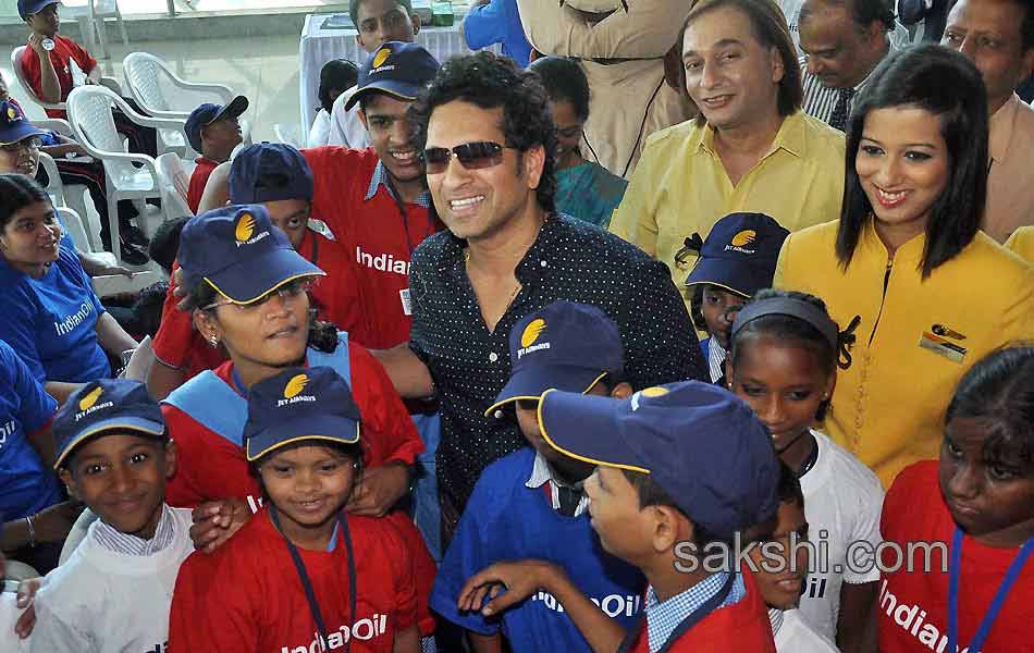 Sachin Tendulkar with under privileged during an event7