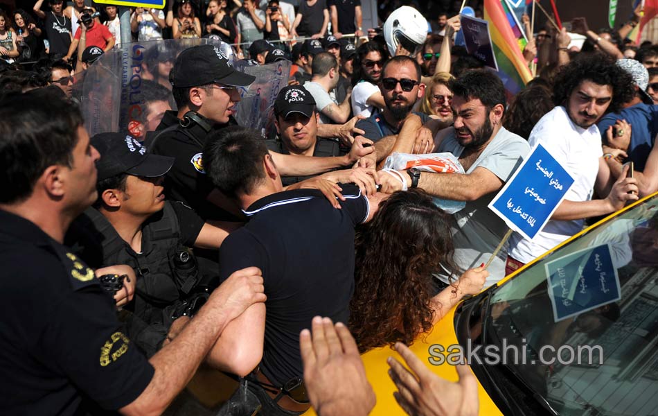 Police fire tear gas to break gay pride parade in Turkey - Sakshi12