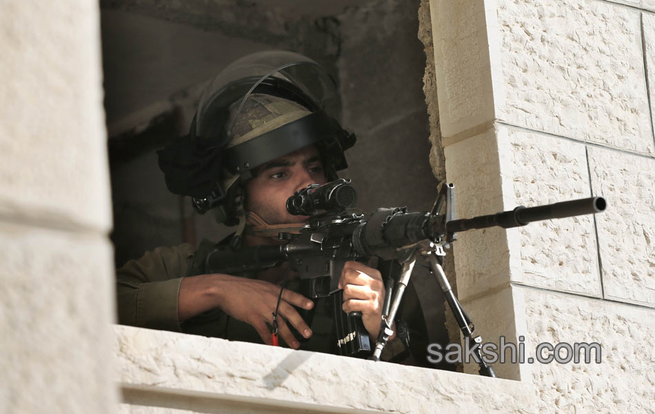 Palestinian demonstrators during clashes in the West Bank13