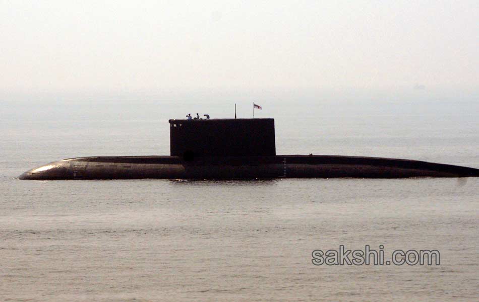 illuminated ships anchored off shore Vizag8