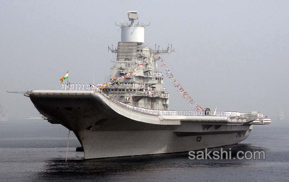 illuminated ships anchored off shore Vizag11