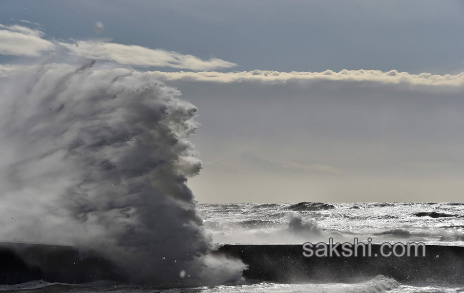 Waves crash near the Port20