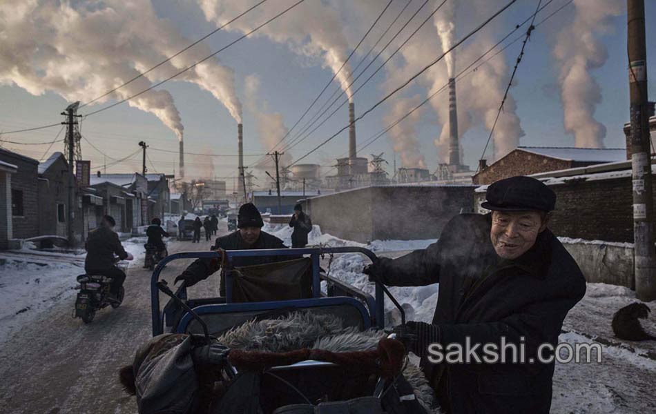 Winners of the 2016 World Press Photo Contest hasbeen anounsed in Amsterdam - Sakshi22