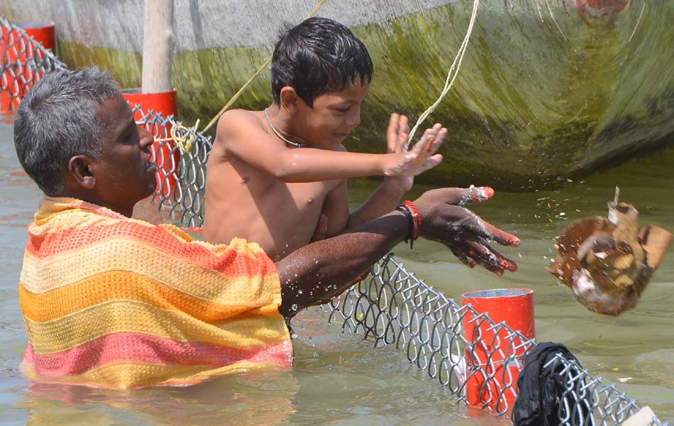 Devotees prayer to Krishna river - Sakshi4