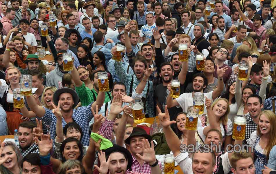 Visitors enjoys the Oktoberfest beer festival in Munich  Germany3