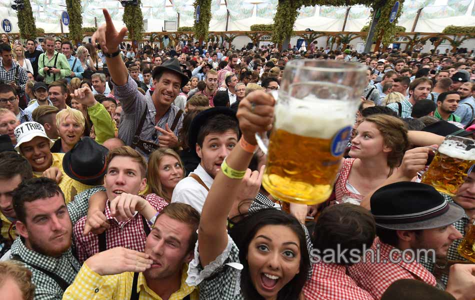 Visitors enjoys the Oktoberfest beer festival in Munich  Germany7