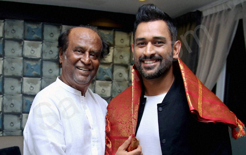 Mahendra Singh Dhoni being greeted Super Star Rajinikanth1