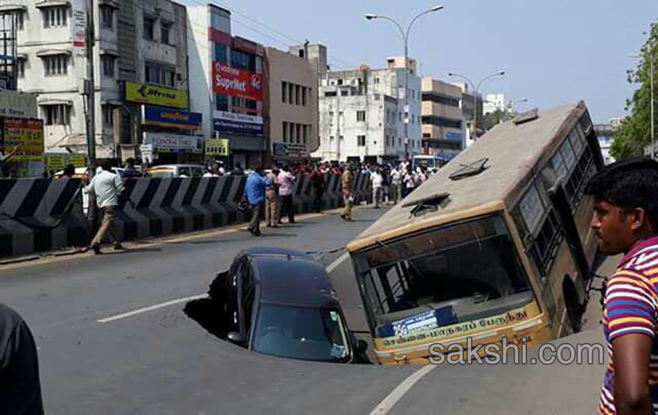 Huge cave in on popular Mount Road in Chennai swallows bus and car - Sakshi11