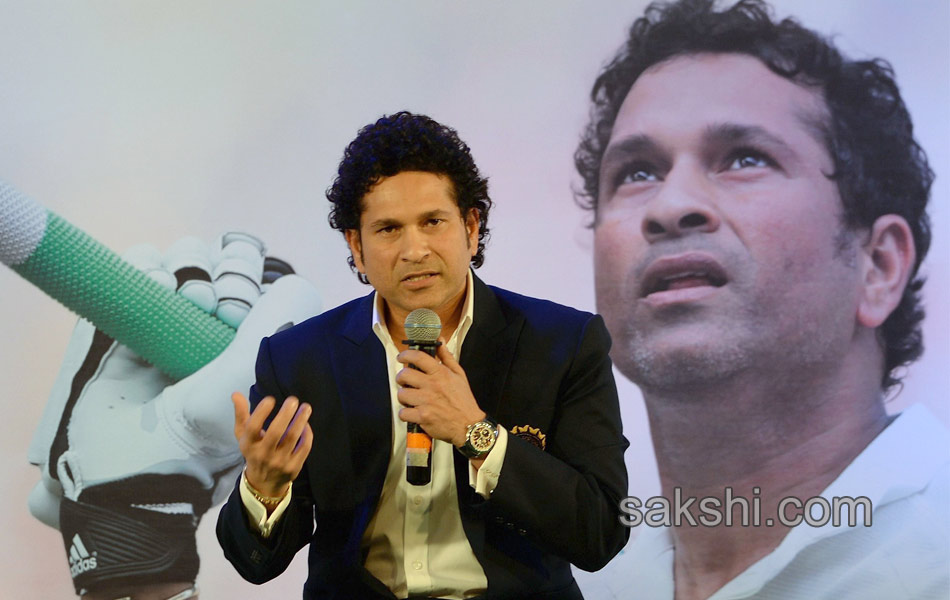 Sachin Tendulkar presents a copy of his autobiography6