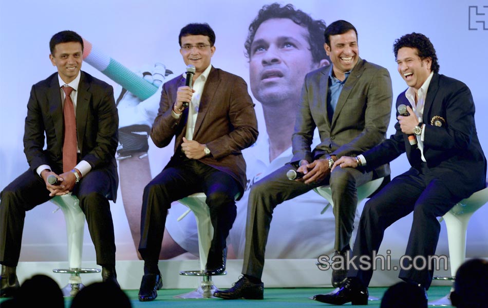 Sachin Tendulkar presents a copy of his autobiography8