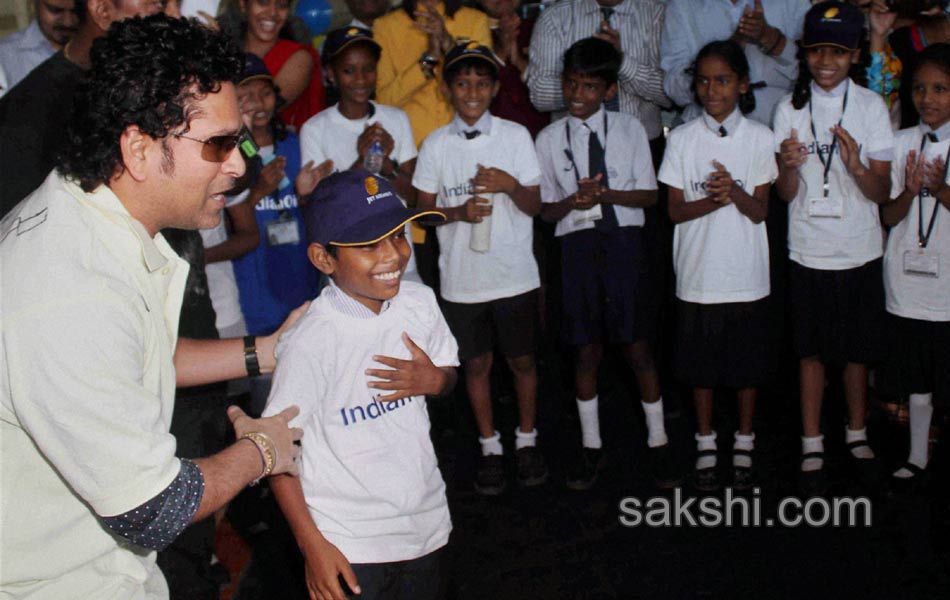 Sachin Tendulkar with under privileged during an event1