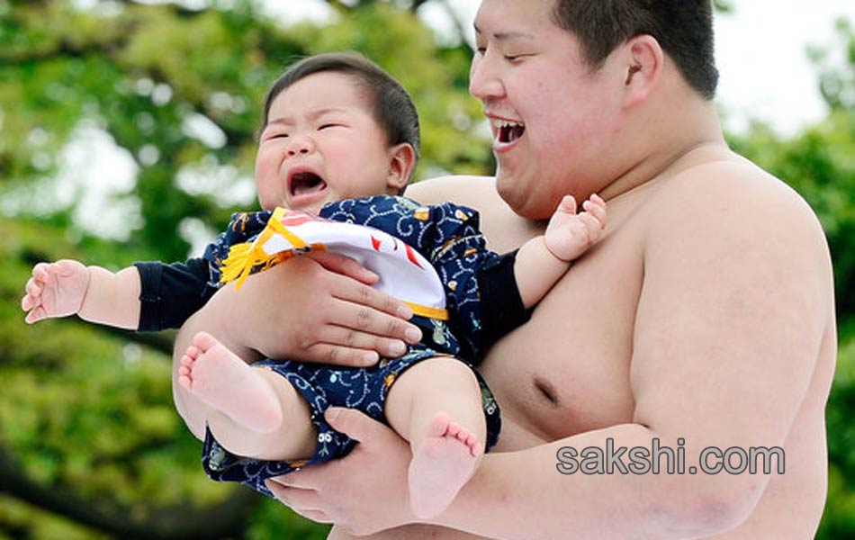 These Sumo Wrestlers Make Babies Cry It Out For Good Health9