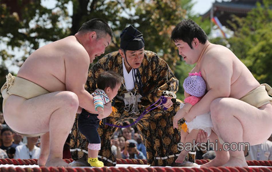 These Sumo Wrestlers Make Babies Cry It Out For Good Health13