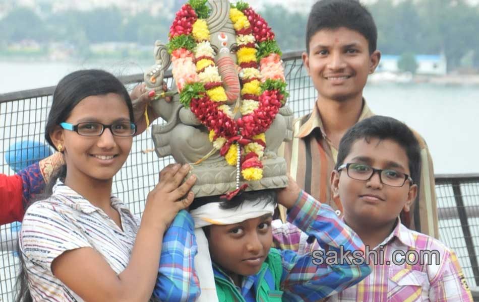 Lord Ganesha idol is immersed in water - Sakshi14