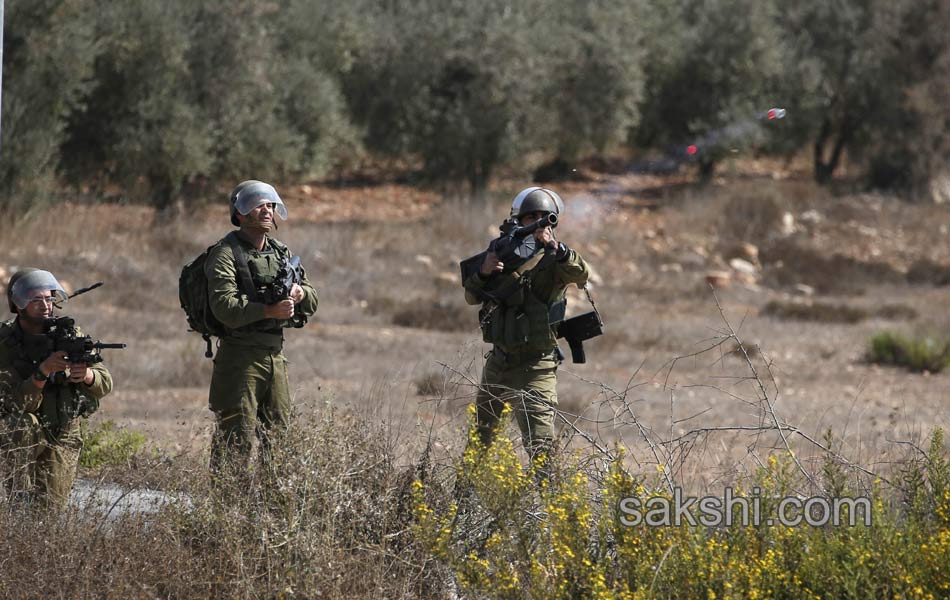 Palestinian demonstrators during clashes in the West Bank6