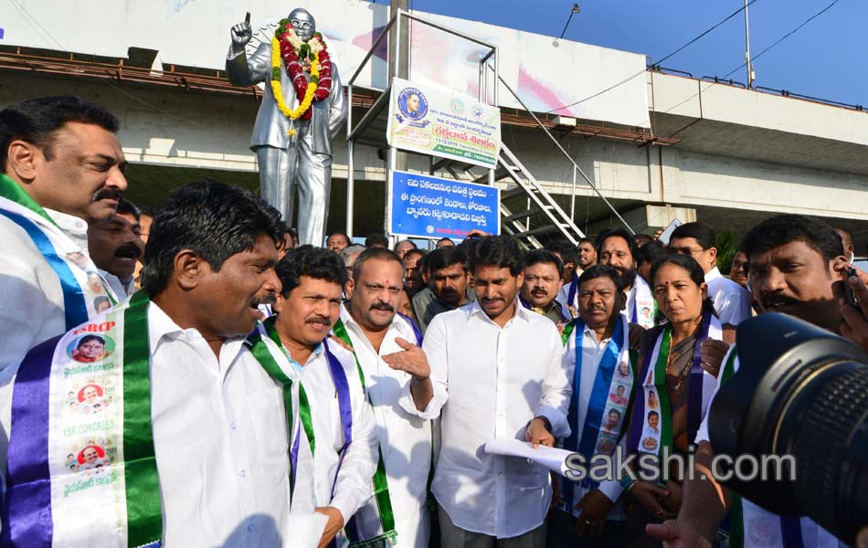 ys jagan mohan reddy performs milk bath to ambedkar statue - Sakshi7