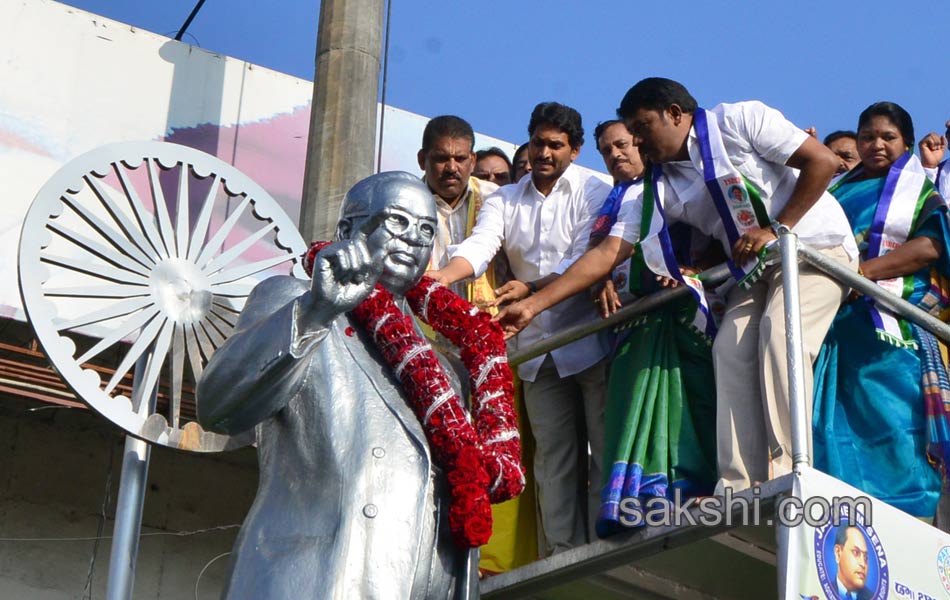 ys jagan mohan reddy performs milk bath to ambedkar statue - Sakshi4